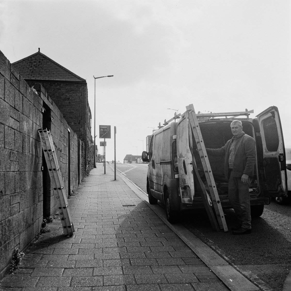 Ladders and shadows on a Cardiff side street